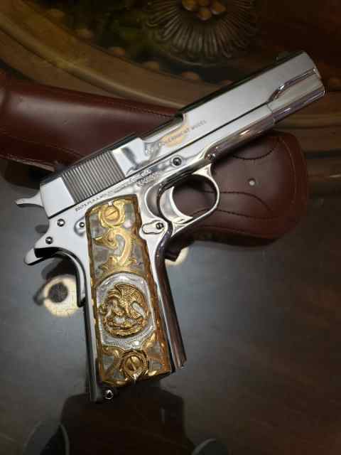 Colt 38 Super Nickel finish with case and some amm