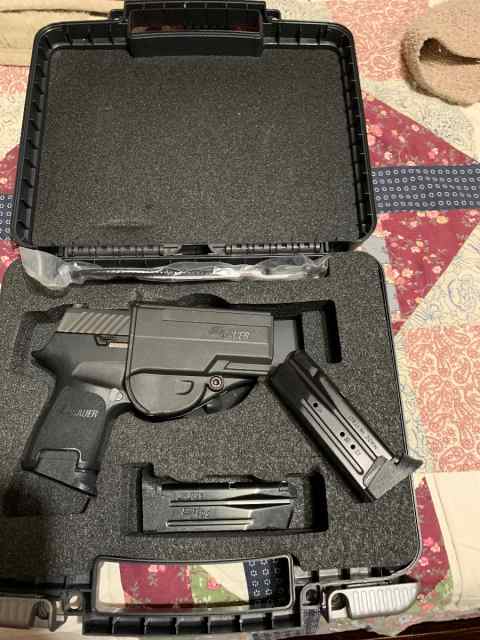 SIG. P320  9 mm 3 17 rd mags And, holster 