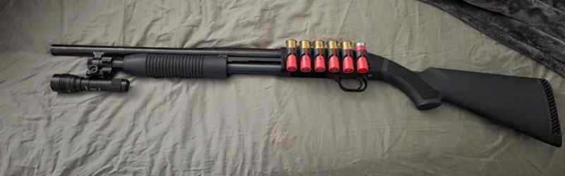 Like new Mossberg 88 with Streamlight Protac