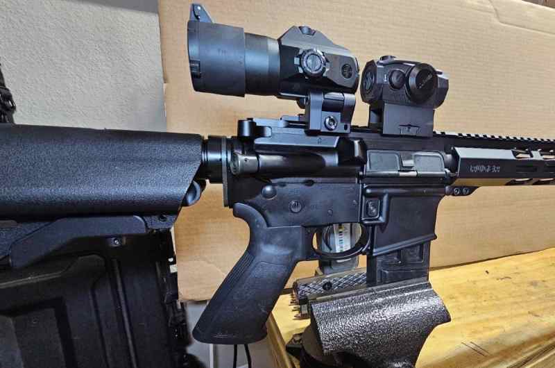 Ruger 556 AR with Romeo red dot and 3x magnifier 