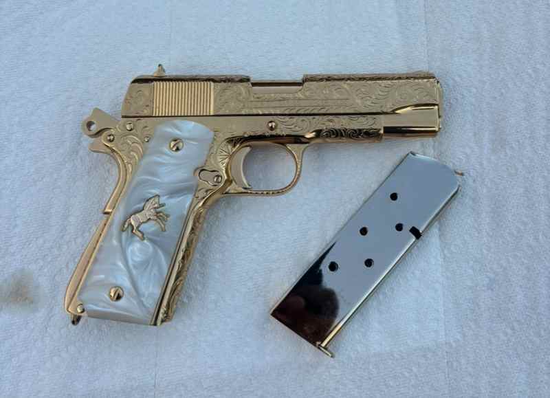 Hand Engraved Colt 1911. Commander 45acp 