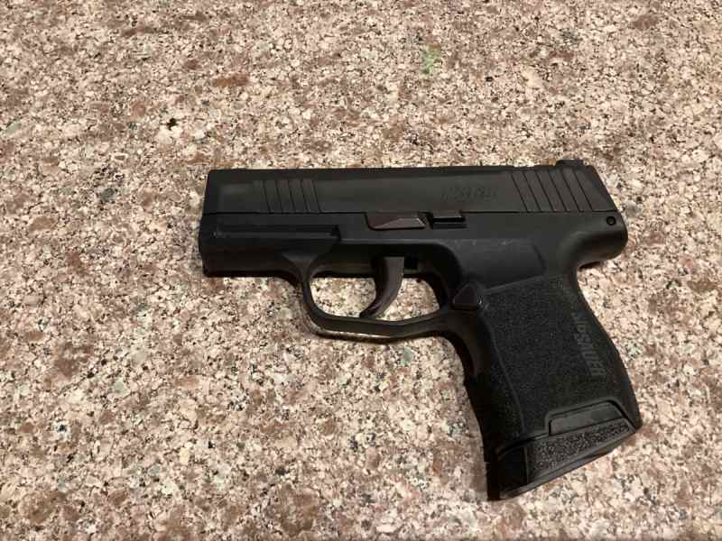 Sig Sauer P365 new in box (never fired)