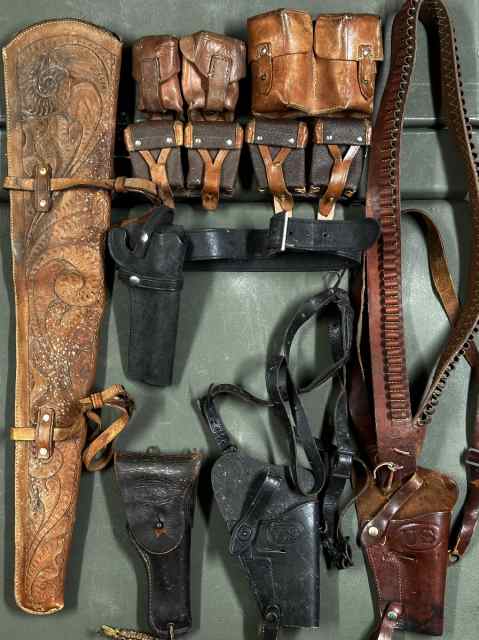 LEATHER GUN SCABBARD HOLSTERS AND POUCHES