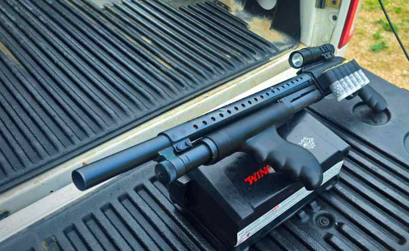 Customized mossberg. 12 gauge pump action shotgun.