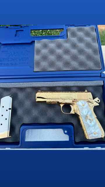 Hand engraved Colt 1911 commander 45acp