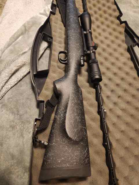 Remington 7mm 08 Model Seven with scope. 